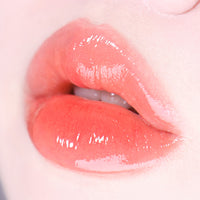 Fruity Glass Tint in a 2.8g container, featuring a bright and colorful appearance, ideal for enhancing beauty products.